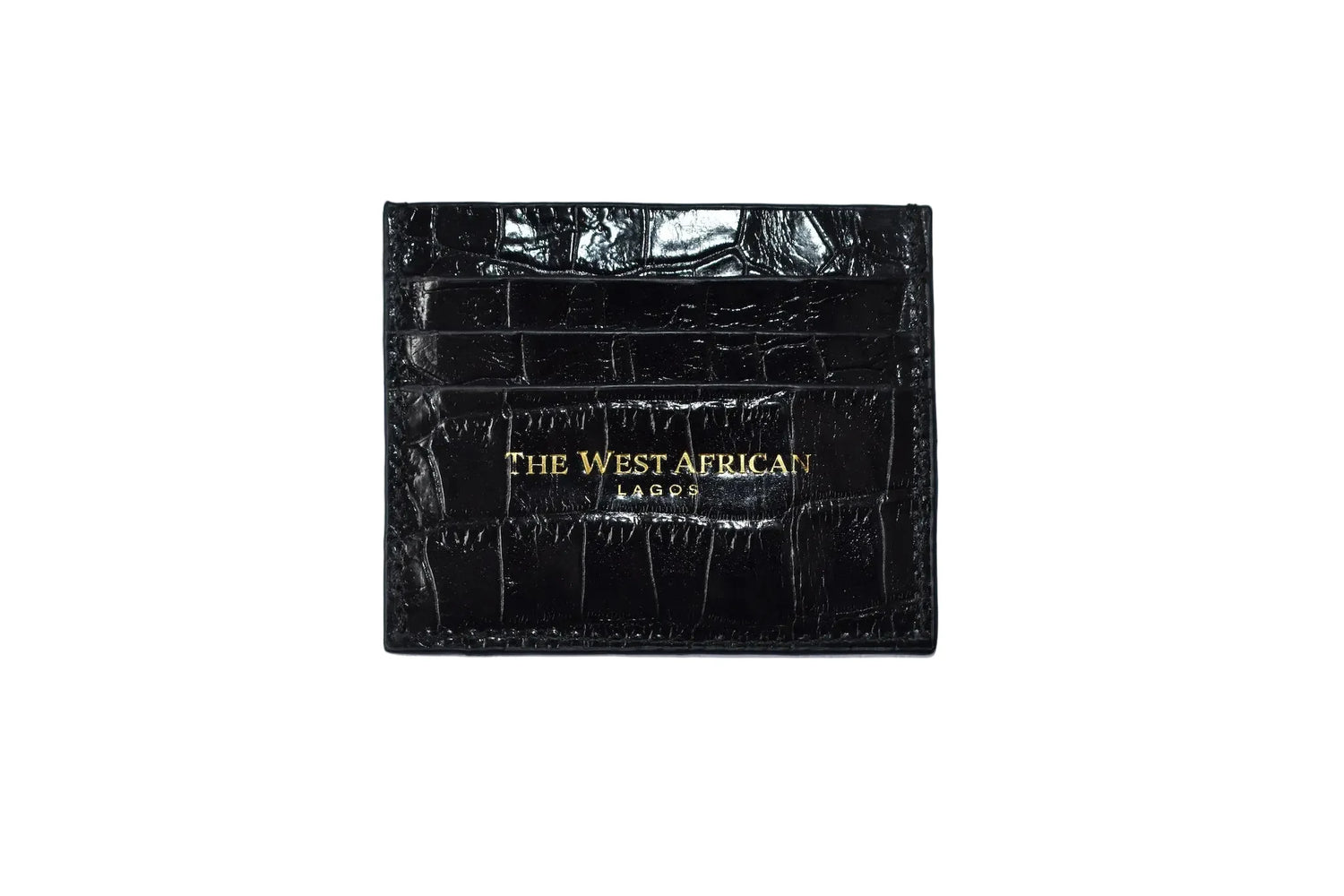 Black crocodile skin wallet with 'The West African' branding on a white background