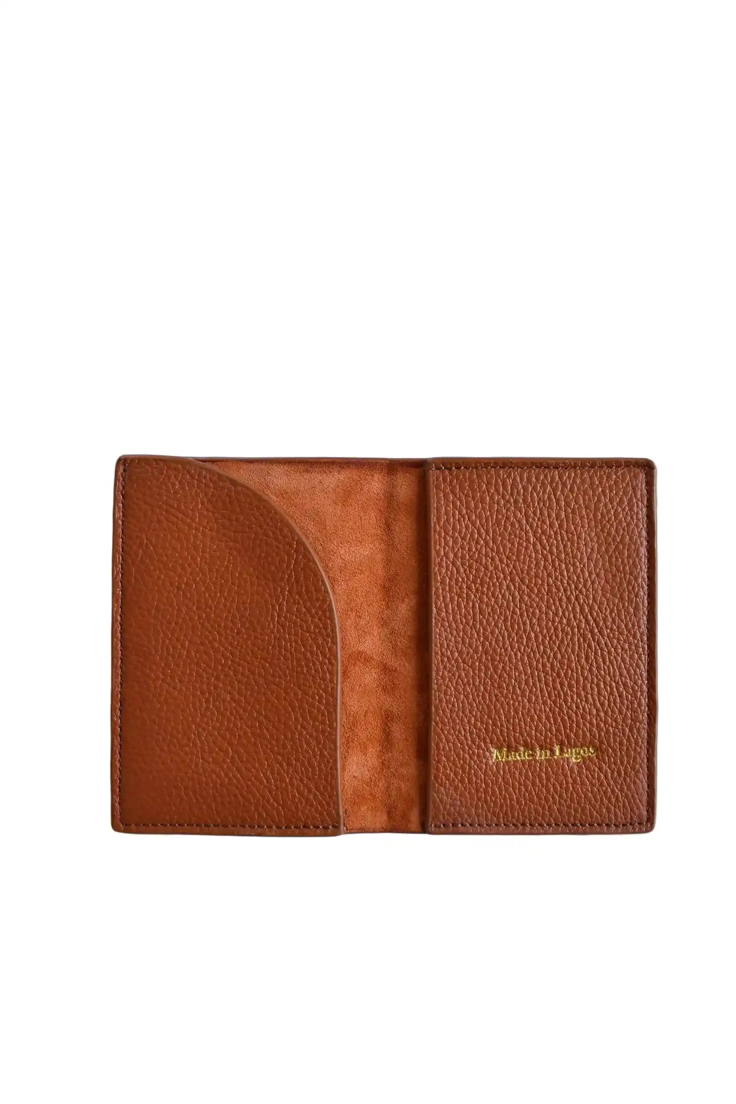 Orange leather wallet with 'Made in Lagos' text on a white background