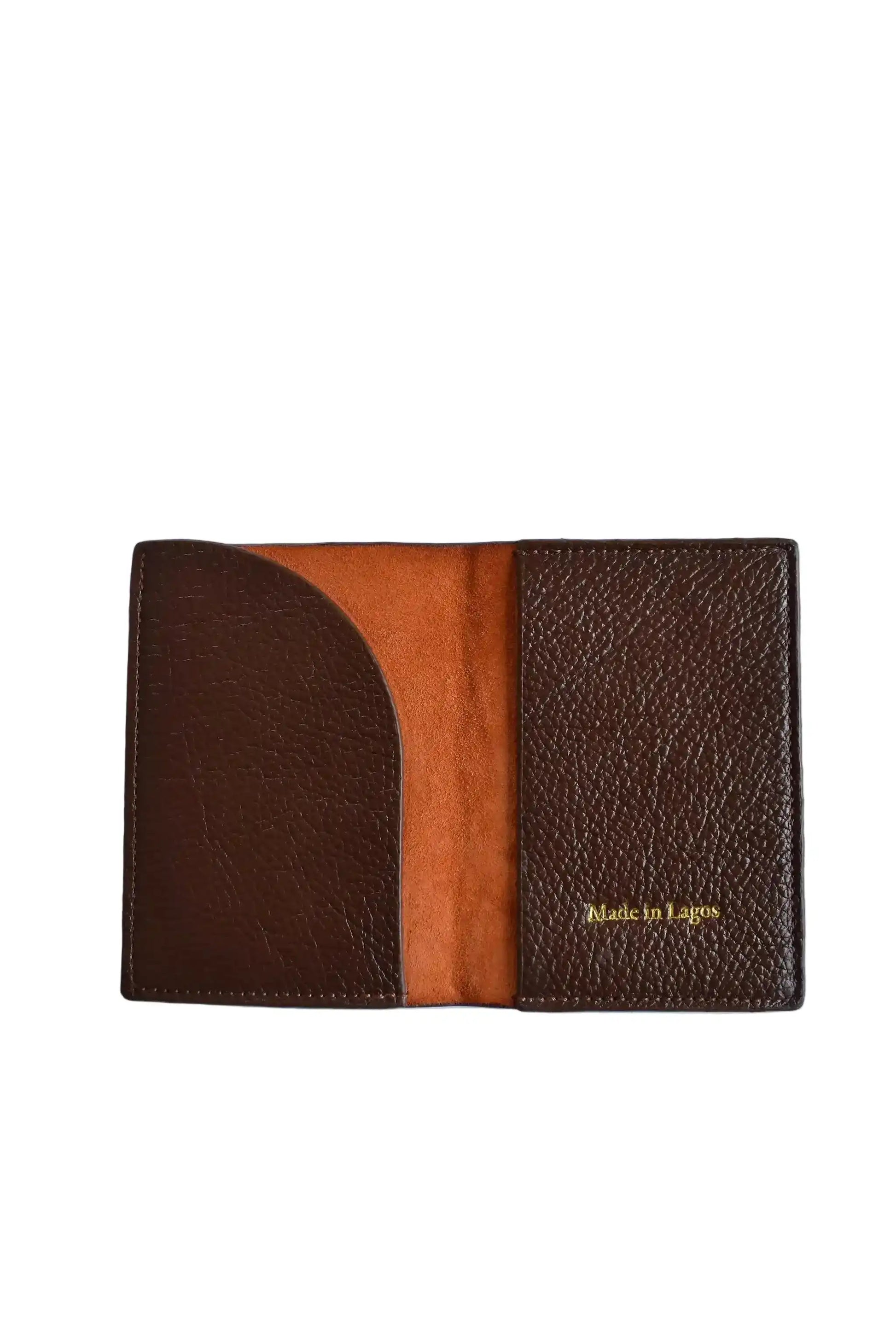 Brown leather wallet with 'Made in Lagos' text on a white background
